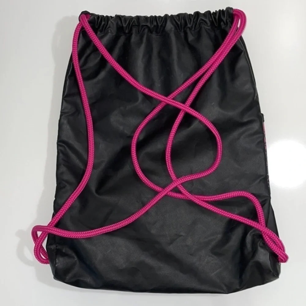 Adidas cinch backpack bag. 13.5” x 18”. Black and pink. Excellent used condition